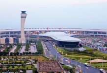International media tours Zhengzhou airport economic zone, showcasing openness & innovation