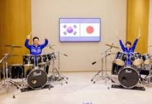 Japan, South Korean leaders drum up rapport playing K-pop after summit