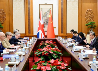China, UK pledge deeper co-op at strategic dialogue in Beijing