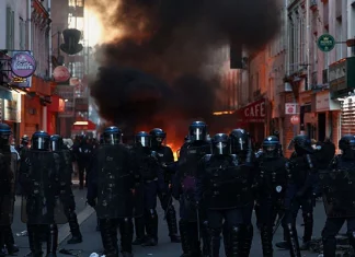 Tensions flare again in Paris as France counts cost of worst unrest in years